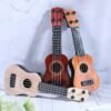 Lenwen Kids Toy Guitar Review Best Mini Ukulele for Beginner Toddlers Lenwen Kids Toy Guitar Review Best Mini Ukulele for Beginner Toddlers